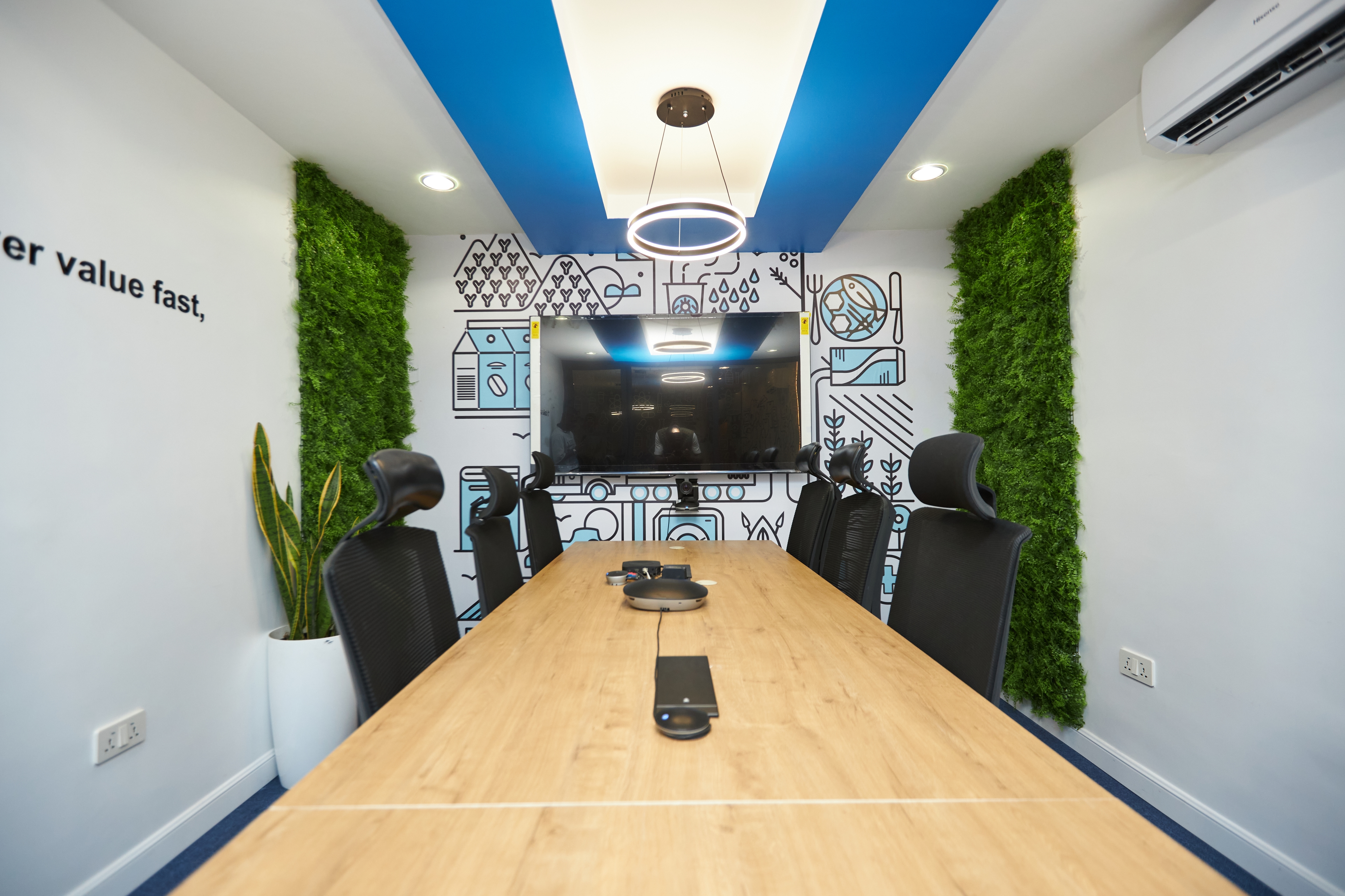 Roche corporate office reception with living green walls